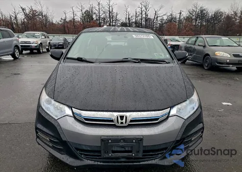 2012 Honda Insight Ex from USA, damaged, VIN JHMZE2H75CS006390
